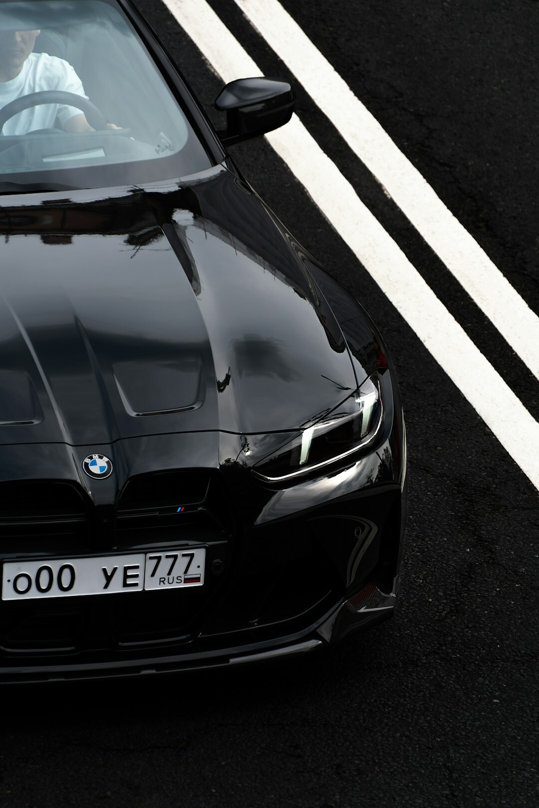 luxury sports car driving on highway