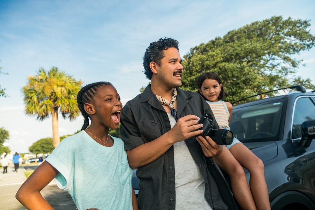 family with electric car