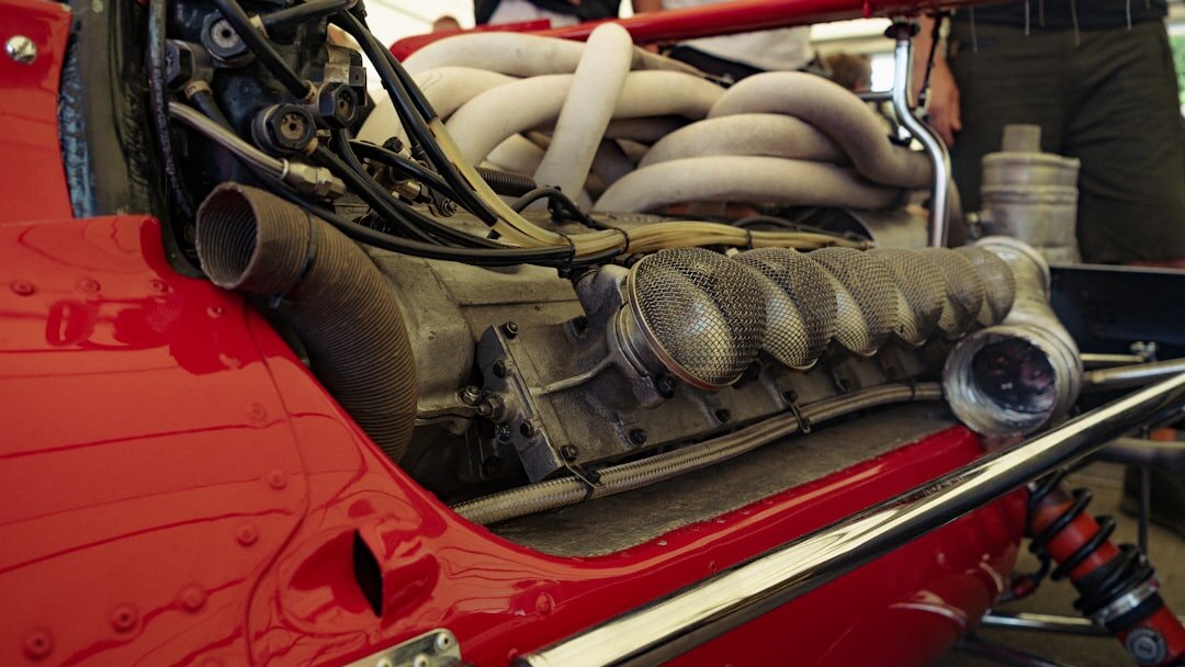 Close up of a V12 engine bay of a luxury grand tourer automobile