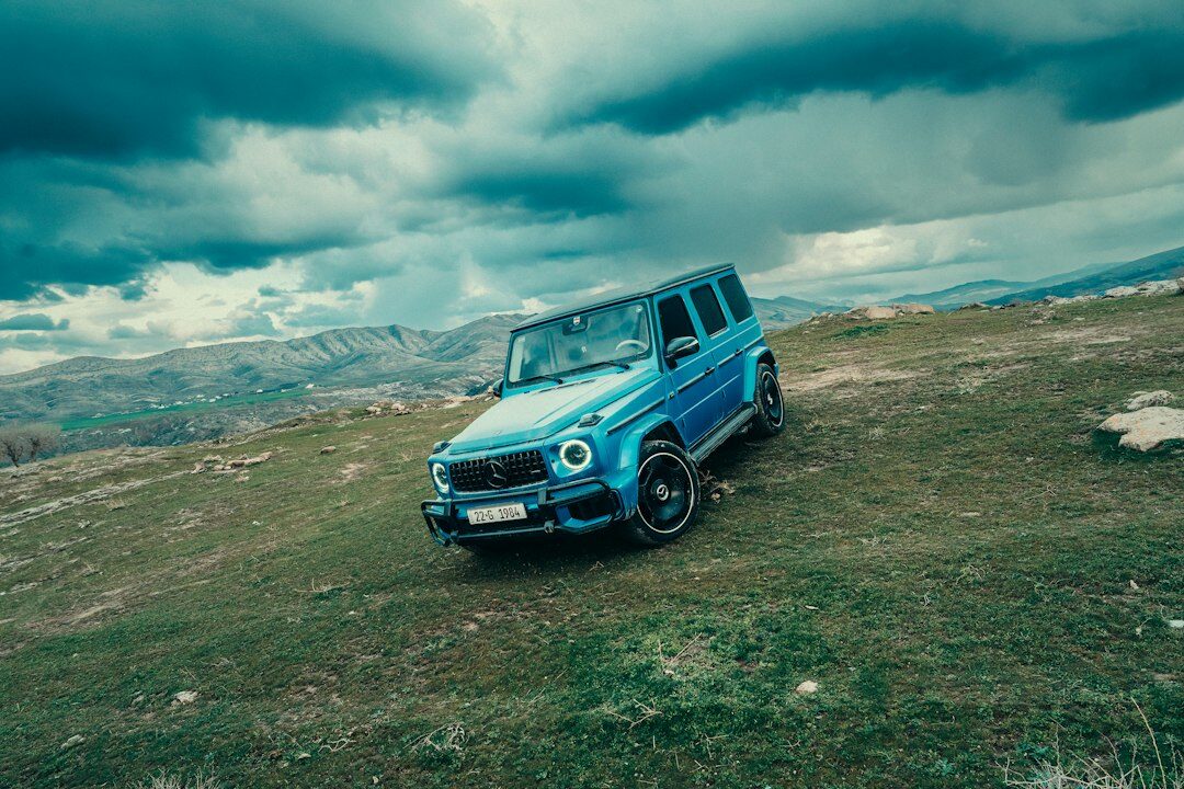 luxury suv on mountain road