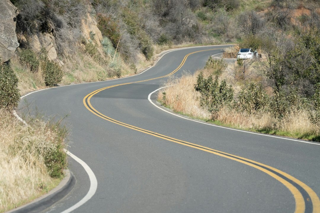 luxury convertible on winding road